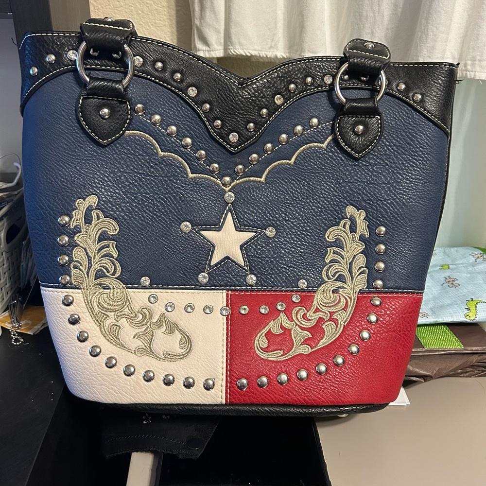 Western hand bag and wallet, red white and blue star in great shape.
